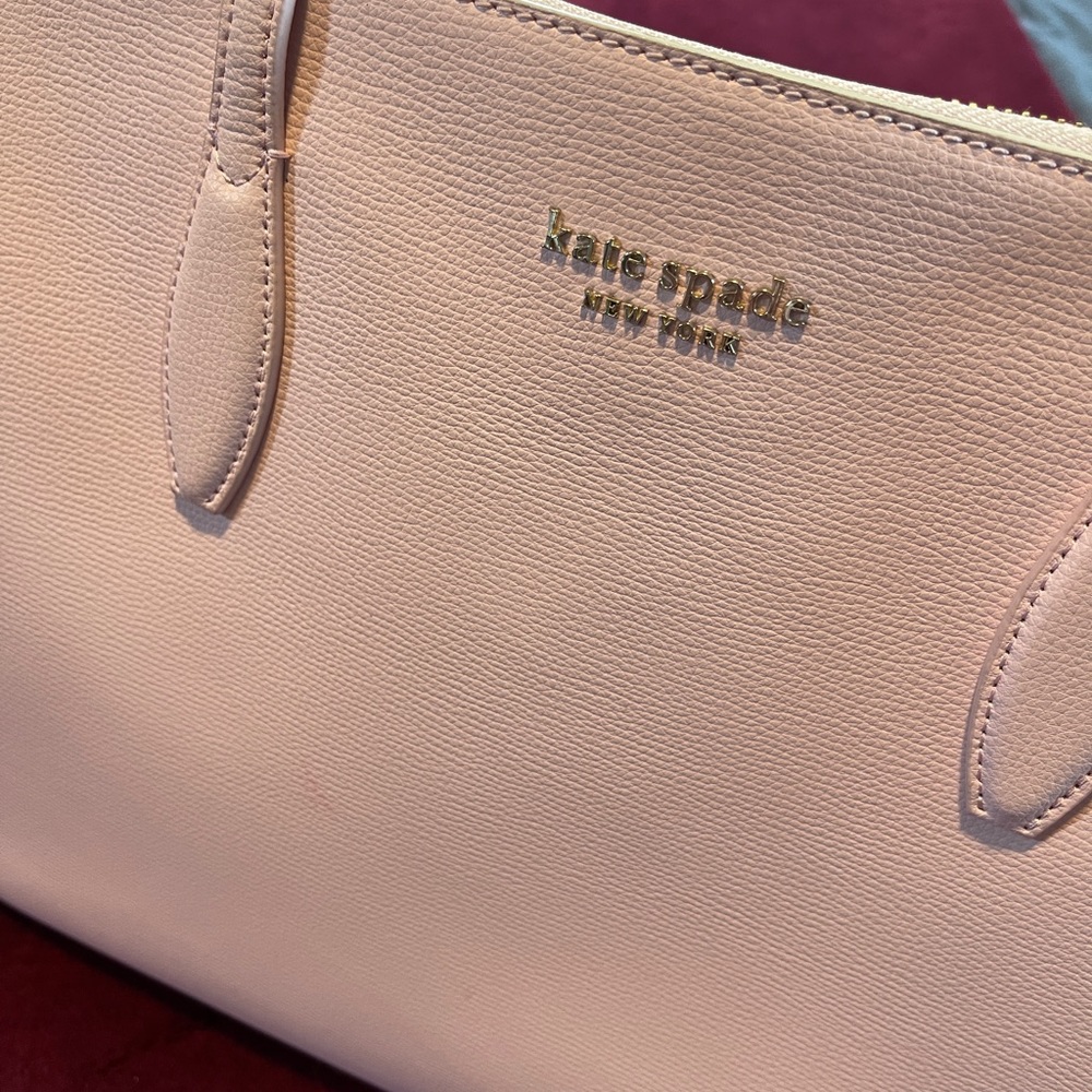 Kate Spade Large Pink Tote with zipper, pockets, laptop sleeve.